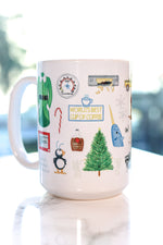 Elf mug. Buddy's signature coat and hat, Jovi's elf hat, maple syrup, fruit spray, the Empire State Building, the Rockefeller Center Christmas tree, the infamous Jack in the Box and raccoon who doesn't want a hug, Buddy's to do list, Mr. Narwhal and Arctic Puffin, the Clausometer, VCR full of cookies, Buddy's spaghetti, handmade rocking horse, shiny mailroom bins, Santa's sleigh and book of names and wishes, and the infamous yellow cabs that don't stop