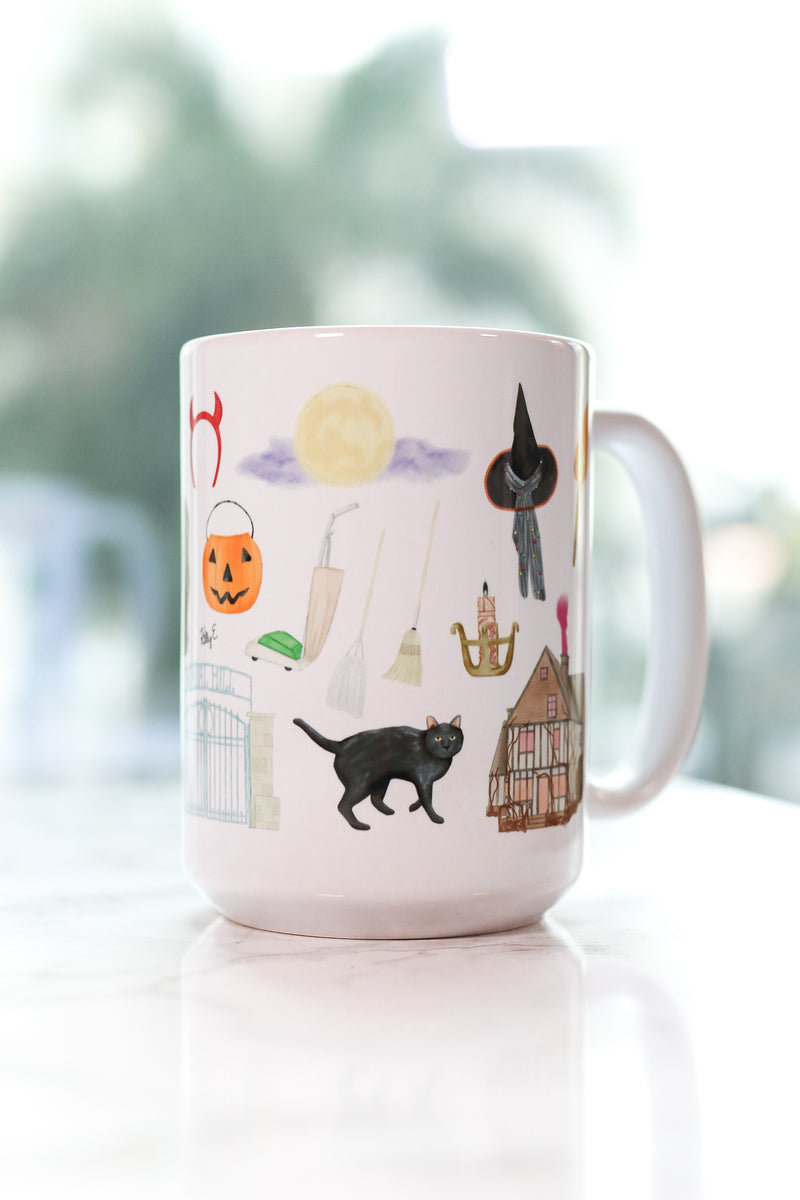 Hocus Pocus mug. The infamous spell book, the Sanderson Sisters' hairstyles, the cauldron, Old Burial Hill cemetery, Billy Butcherson's headstone, the vacuum, broom, and mop, the black flame candle, Dani's witch hat, Binx the black cat, the Sanderson house