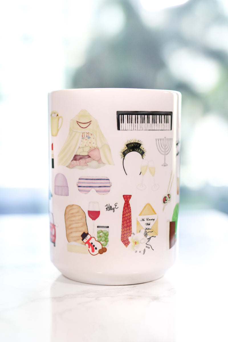 The Holiday movie Christmas mug. Iris's cottage in Surrey, Amanda's house in LA, hot chocolate with five marshmallows, the girls' tent, Frappuccinos with a little dollop and big dollop, a night with Arthur invitation and his tie, Arthur's Oscar, Arthur's orchid corsage for Iris, Amanda's sleep mask, Miles's keyboard, Iris's Mini Cooper, Berry Kiss lipstick, and more!