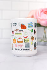 The Office mug. Prison Mike's bandana, the guide to Throwing a Garden Party, Pam's ripped wedding veil and Jim's cut tie, Diversity Day Cards, Cafe Disco disco ball, Nard dog, Stanley's crossword puzzle, Pam's teapot, pretzel day, the bouncing dvd logo, the Bushiest Beaver Dundie Award, the It Is Your Birthday banner, Kevin's chili, tickets to Sandals, Dwight's stapler in jello, Pam's painting, a Scott's tots t-shirt